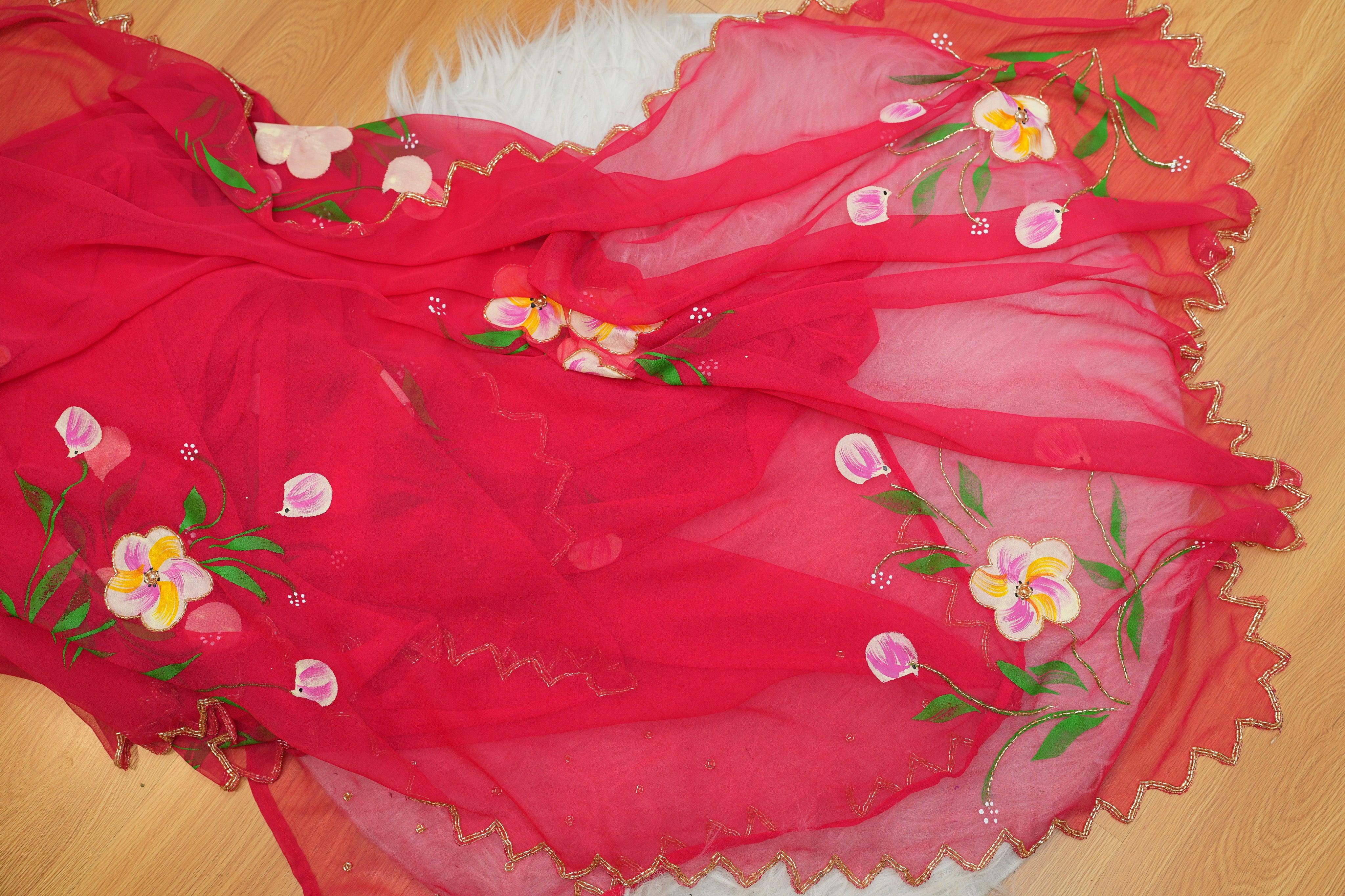 Red Hand-Painted Georgette Saree with Exquisite Handwork Detailing