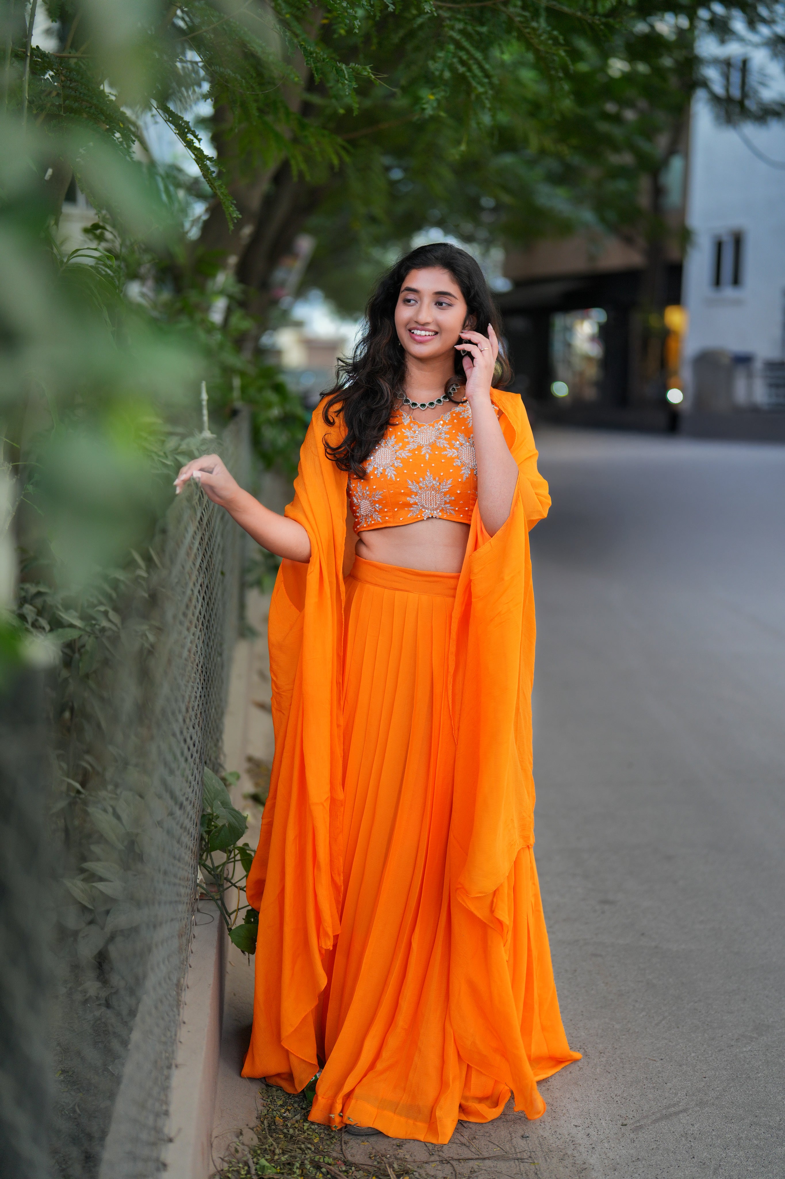 Orange pleated lehenga crop top