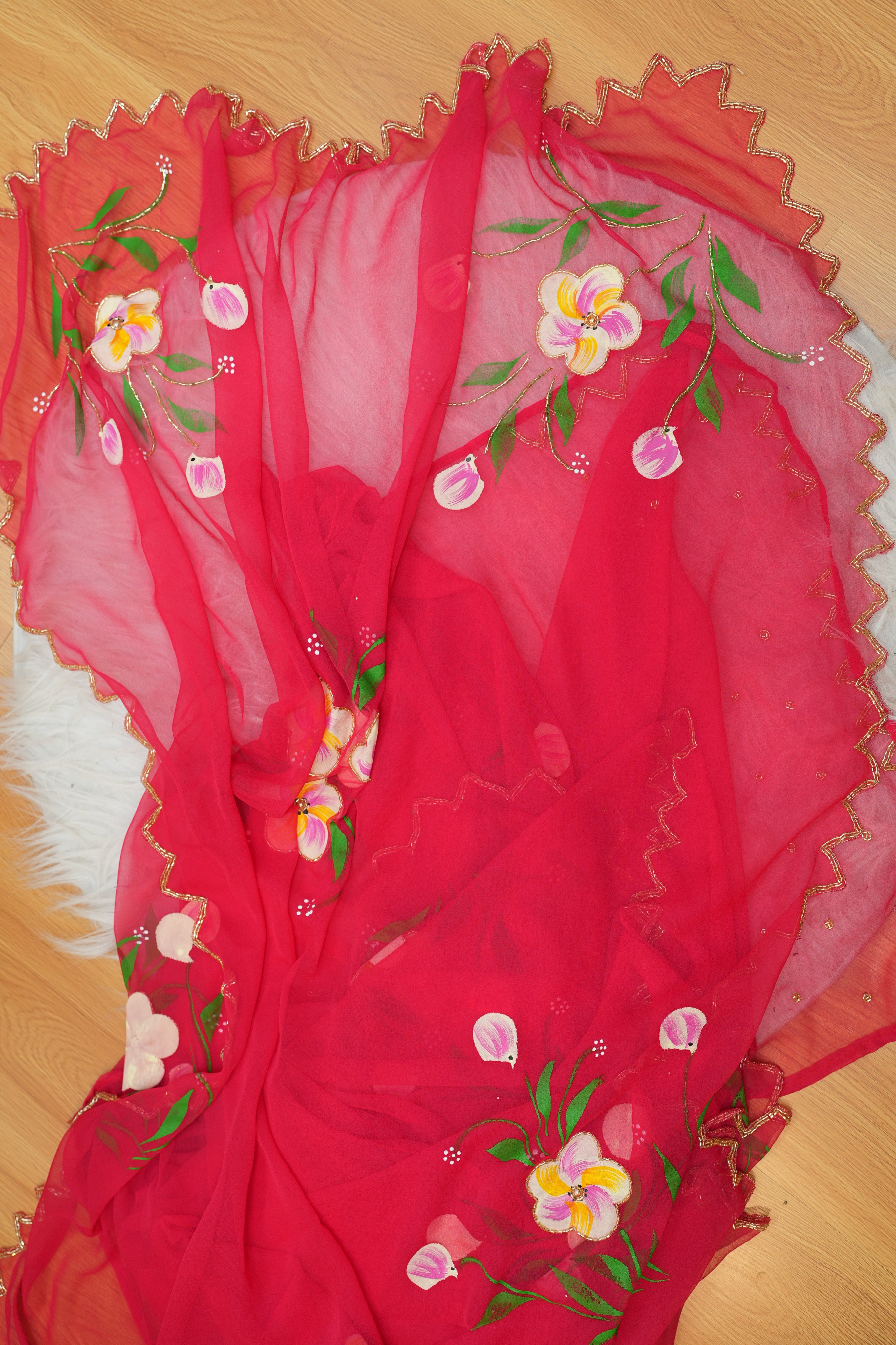 Red Hand-Painted Georgette Saree with Exquisite Handwork Detailing